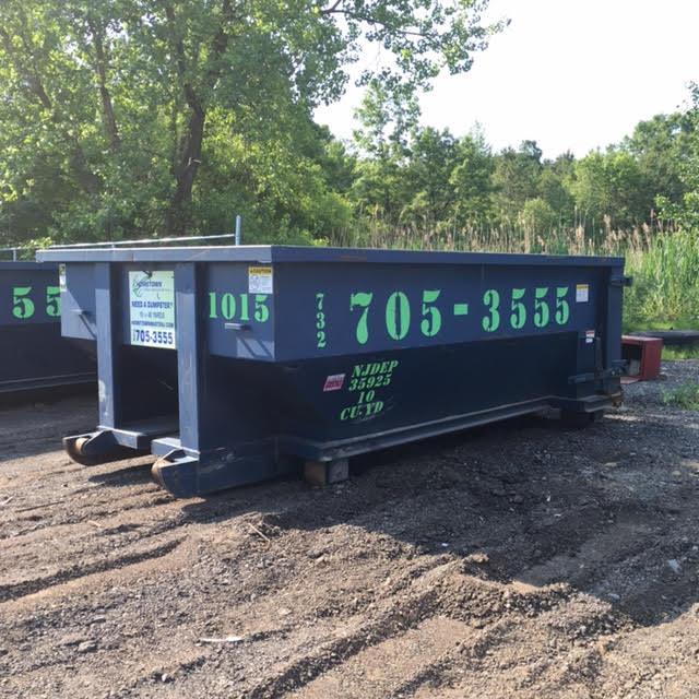 a 10 yard dumpster being used for a landscaping project