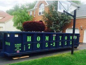 20 yard dumpster in residential driveway