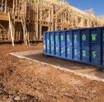 Hometown waste dumpster in front of construction