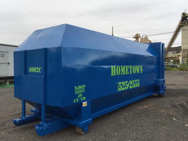 blue 40 yard trash compactor