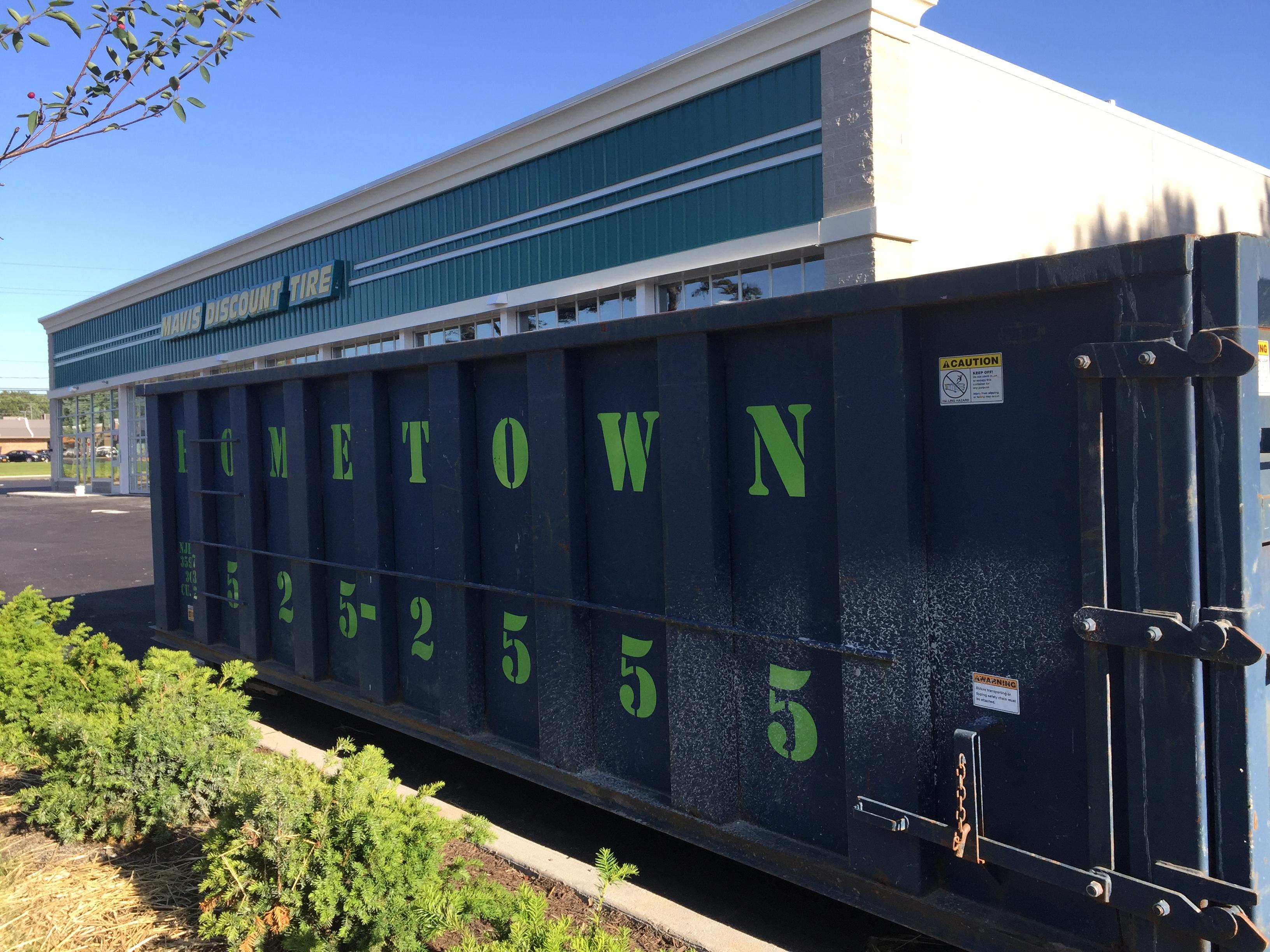 dumpster at mavis discount tire store